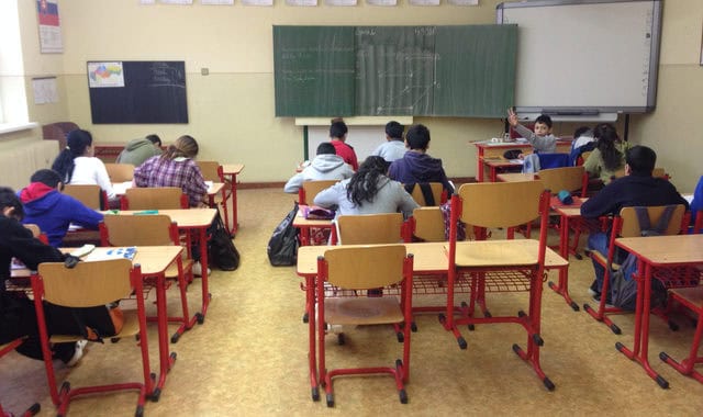 Classroom scene with students and teacher, education in Bali Stay beach resort area.